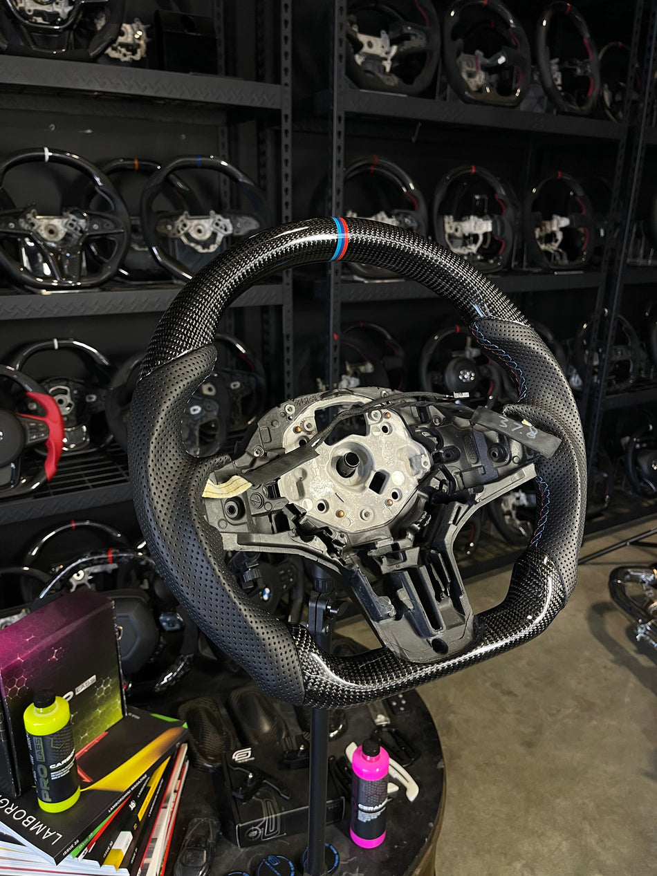 [Media/Test] BMW G-Series (M Performance Wheel) - Sport - Gloss Carbon - Perforated Leather - BMW M Colors Stitching - BMW M Colors Stripe (Heated)
